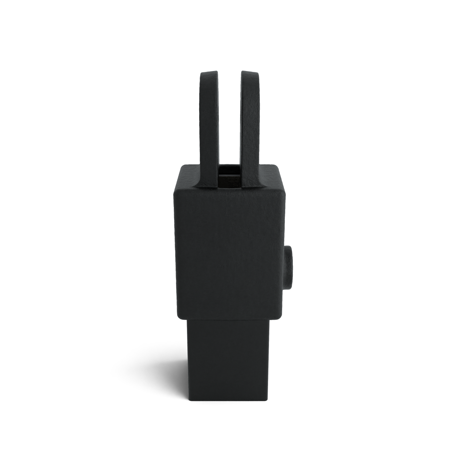 Pièce métallique noire mate à la surface rugueuse, présentée verticalement sur un fond blanc. Plus large en haut, avec deux branches parallèles orientées vers le haut et un renflement cylindrique sur le côté. Base étroite en bas, ombre à droite.